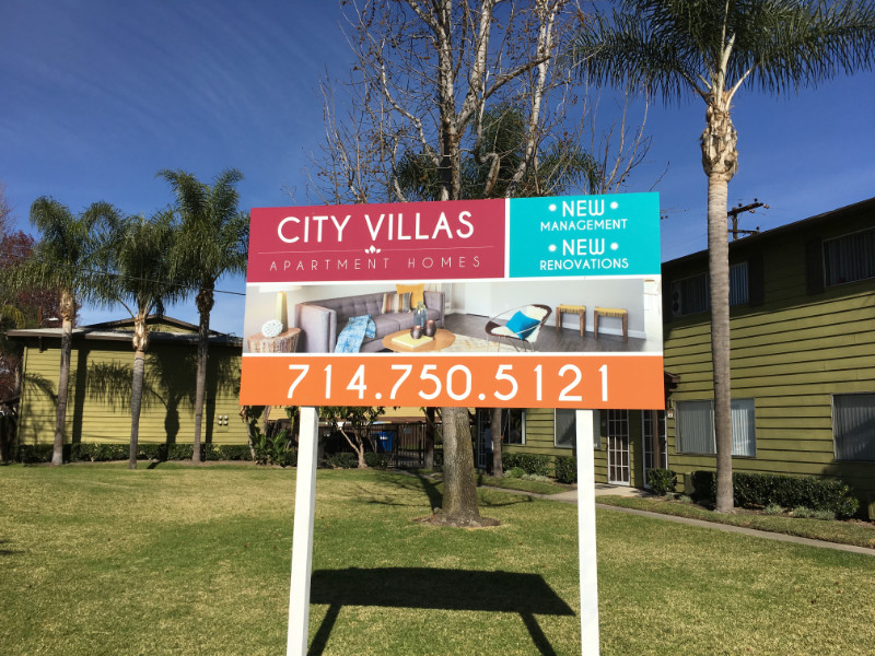 large apartment sign
