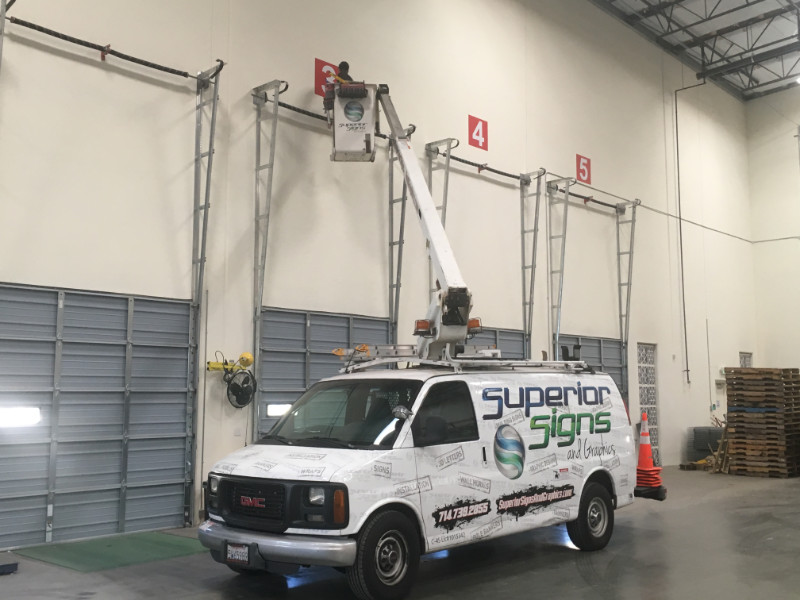 warehouse sign install