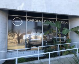 Nissan Dealer Adds perforated window graphics in Garden Grove CA