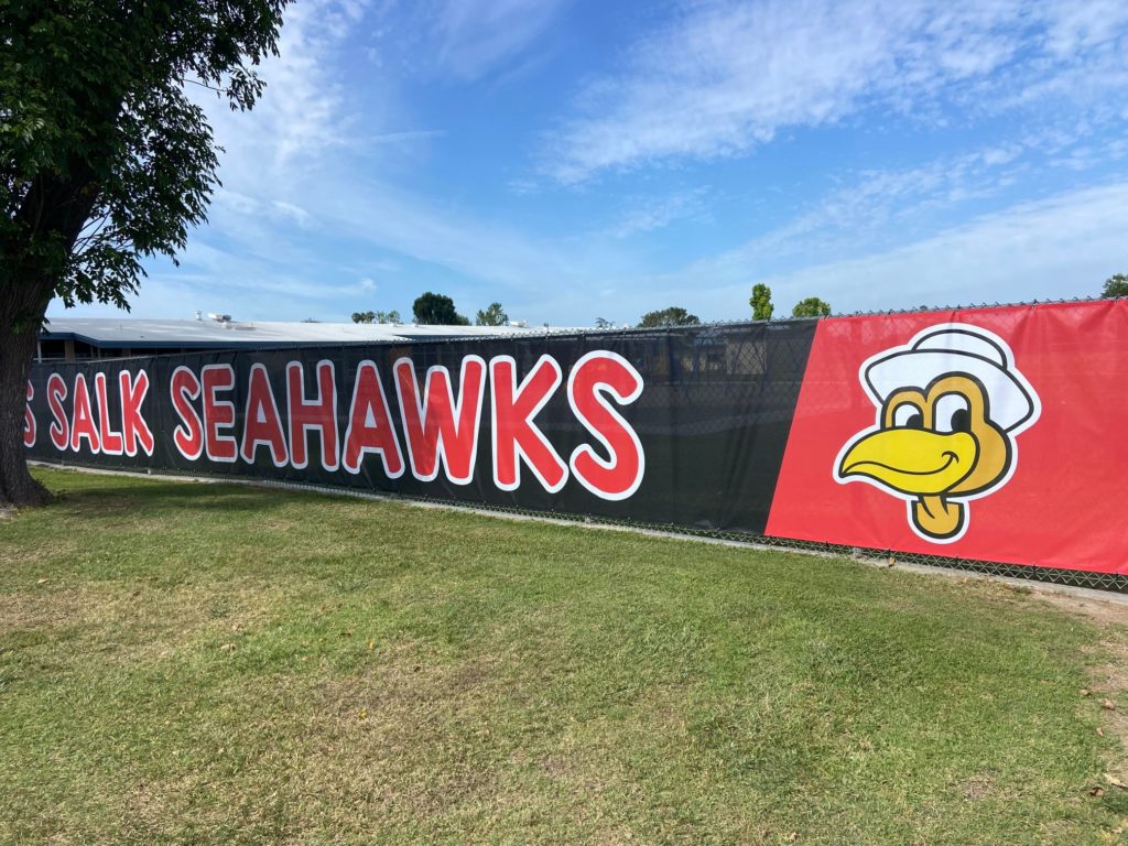 School chain link fence banners in Orange County, CA
