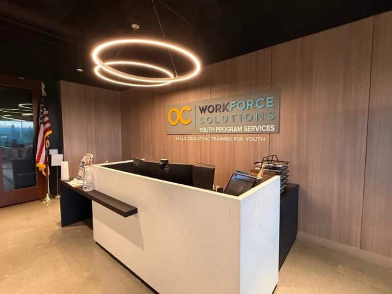 custom logo wall sign ISAT reception area La Mirada CA